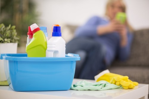 Cleaner working carefully in a tidy, well-managed space